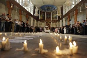 candle memorial Syrian Church.JPG